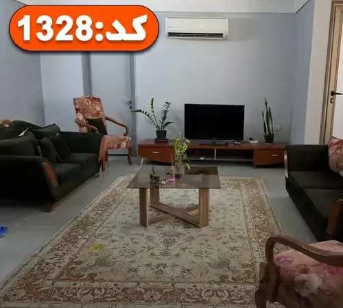 مبلمان سبز و مشکی رنگ و میز تلویزیون سالن نشیمن ویلا در بندر عباس