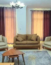 اتاق پذیرایی و مبلمان آپارتمان در بندرجاسک 15645446